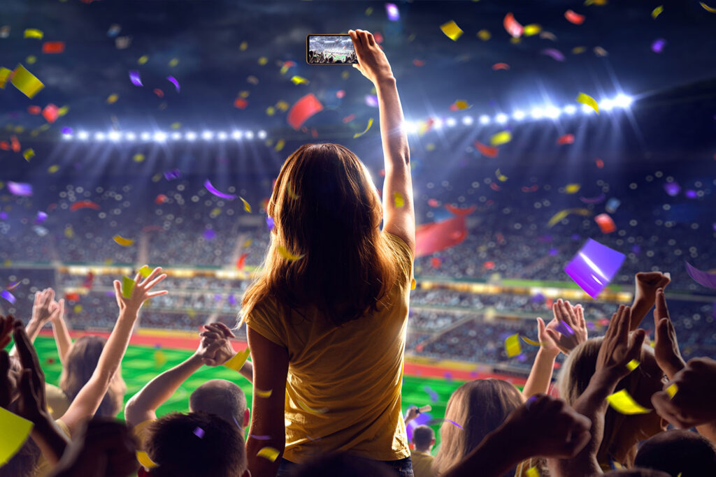 sports fan using phone